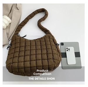Quilted puffer hobo bag interior capacity showing fits tablet and smartphone