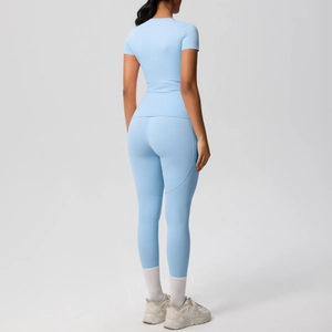 Rear view of light blue high-stretch yoga set showing slimming fit and ergonomic seams