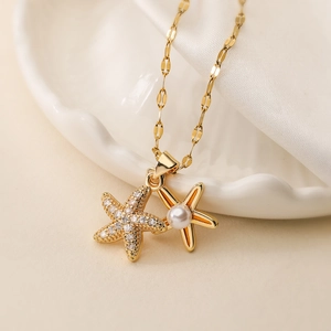 Exquisite 18K gold-plated starfish pendant necklace with zircons and pearl on white silk