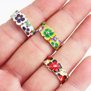 Adjustable gold flower rings with colorful enamel petals and zircon centers