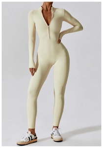 Detail of high-stretch yoga jumpsuit featuring a front zipper and stand-up collar design