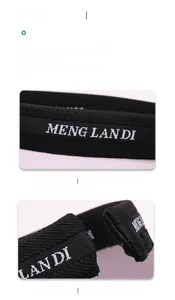Detail view of black sun visor featuring Meng Lan Di letter logo and elastic headband