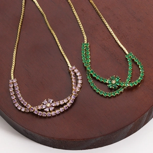 Elegant 18K gold plated double row floral bracelet with purple and green zircon crystals