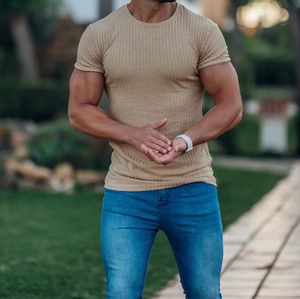 Detailed knit texture of khaki slim fit ribbed t-shirt for men in outdoor setting