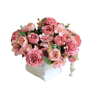 European vintage silk faux flower bouquet with pink roses and white geometric ceramic vase