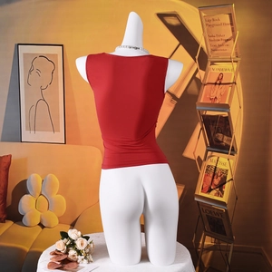 Back view of a red sleeveless slim-fit knit vest displayed on a female mannequin