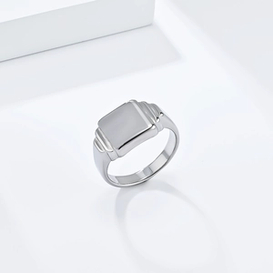 Polished silver square signet ring with stepped architectural band for neutral style