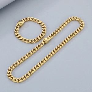 Golden Cuban link jewelry set including a thick polished necklace and bracelet for men