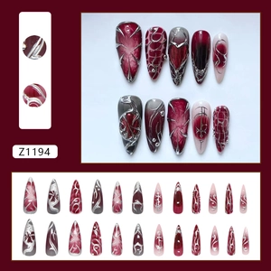 Dark gothic stiletto press-on nails with red gradient and silver 3D metal line accents