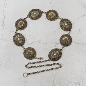 Bohemian vintage gold metal chain belt with sun pattern and turquoise stone accents
