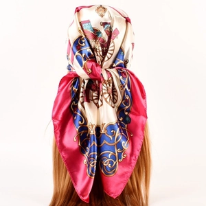 Fashionable silk scarf with carriage print styled as a headband for a vintage look