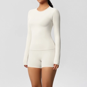 Close-up of off-white brushed yoga set fabric showing high elasticity and seamless texture