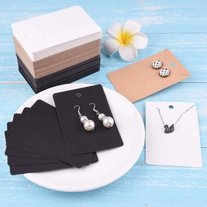 Set of square jewelry display cards in white black and kraft brown for earrings and necklaces
