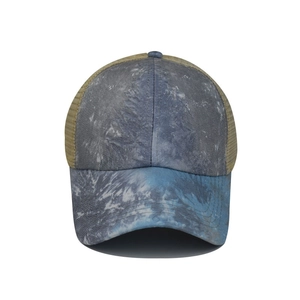 Detail of washed tie-dye ponytail baseball cap with breathable mesh back and marble print