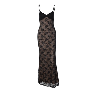 Close-up of black lace pattern with nude lining on V-neck backless evening dress