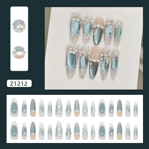 Blue cat eye clover press-on nails with 3D pearls and rhinestones in almond shape