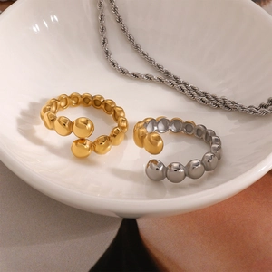 Minimalist 18k gold plated stainless steel bead rings in gold and silver dual-tone finish