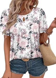 Detail of floral print short sleeve blouse with crew neck and stylish cut-out design