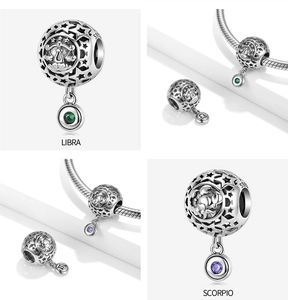 Detail of S925 silver Libra and Scorpio zodiac charms with colorful crystal stones