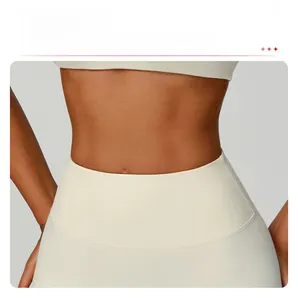 Detail view of high-waisted yoga shorts featuring tummy control and anti-roll design