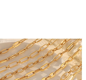 Detailed macro view of gold-tone textured chain links and polished oval steel segments