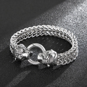 Detail of vintage double tiger head bracelet with thick wheat braid stainless steel chain