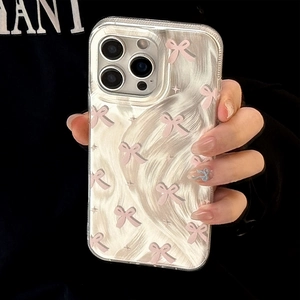 Detail of transparent iPhone case featuring cute pink bow patterns and IMD finish