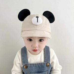 Detailed view of beige baby baseball cap with cute black 3D bear ears and soft brim