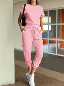 Detail of pink short sleeve T-shirt and cargo pants set with drawstring waist and pockets