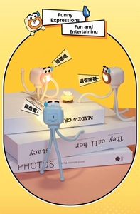 Close-up of mini octopus LED night lights with flexible legs in pink, blue and brown