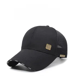 Detail view of mesh baseball cap with gold metal plate and FARD lettering on brim