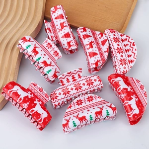 Christmas theme hair claw clips set with reindeer and snowflake patterns in red and white