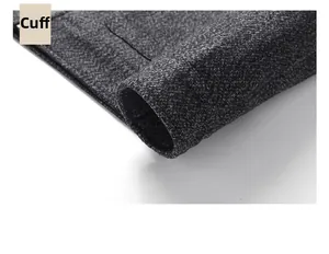 Detailed view of the dark grey wool blend jacket cuff showing high-quality fabric texture