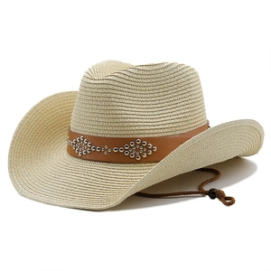 Classic straw western cowboy hat in beige with studded leather band and chin strap
