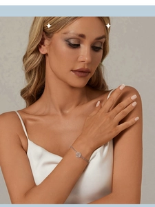 Close-up of s925 sterling silver rose bracelet with sparkling stones on model wrist