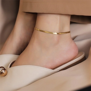Elegant gold-tone flat snake chain anklet for women with minimalist fish scale texture
