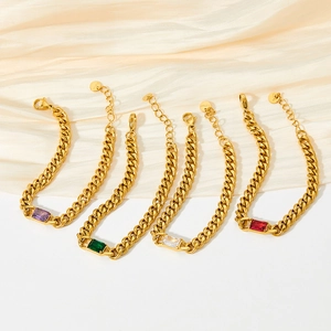Bracelet chaîne cubaine vintage en or avec zircons taille émeraude de diverses couleurs