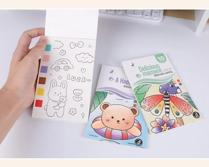 Detail of portable watercolor book with built-in paint palettes and 10 pages for kids