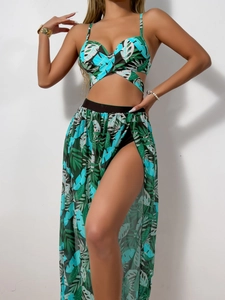 Detail view of the tropical leaf print sarong and high-slit mesh skirt three-piece set