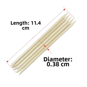 Detail view showing 11.4cm double-ended orange wood sticks for professional nail art manicure