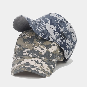 Close-up detail of digital camouflage patterns on durable outdoor baseball caps