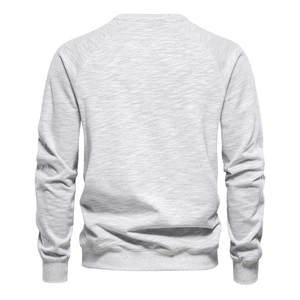 Rear view of heather grey crewneck sweatshirt showing detailed cotton fabric texture