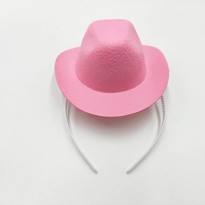 Pink mini cowboy hat headband for birthday parties and events with felt finish
