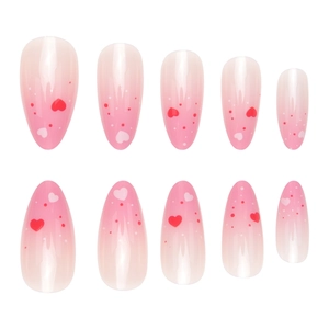 Pink ombré almond press-on nails with red heart patterns and dots, 10-piece set