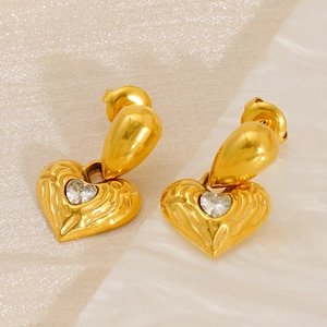 Hammered gold heart drop earrings with radiant texture and crystal zircon stone