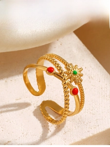 Detailed close-up of retro sun ring with colorful oil drip and gold beaded texture