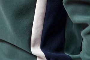 Detail of three-color vertical stitching and high-quality knit fabric texture