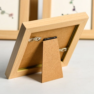 Square wooden photo frame back view with MDF board, metal swivel clips and sturdy kickstand