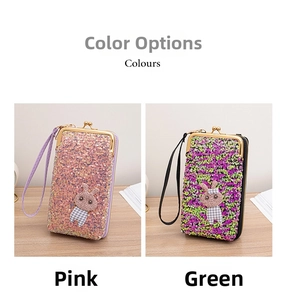 Detail view of colorful sequin handbags with cute rabbit decor in pink and green colors