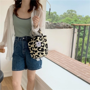 Leopard print canvas tote bag featuring large capacity for shopping and daily casual use